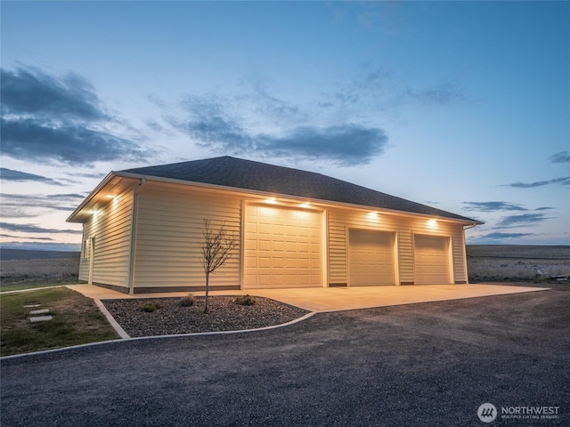 23201 Rd 12 NW, Quincy, WA 98848 - view of garage at dusk