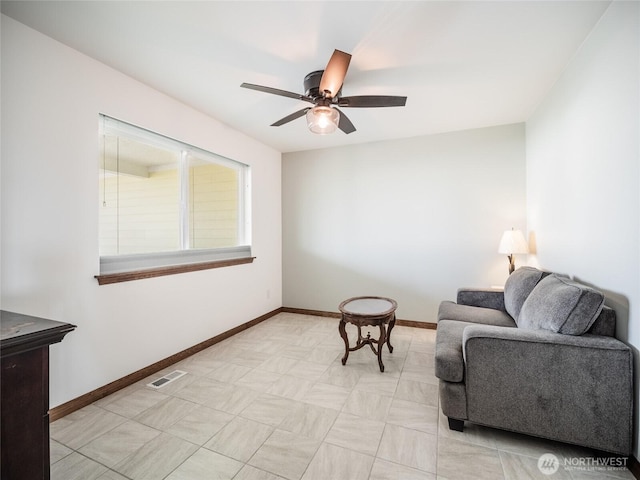23201 Rd 12 NW, Quincy, WA 98848 - living area featuring a ceiling fan and baseboards