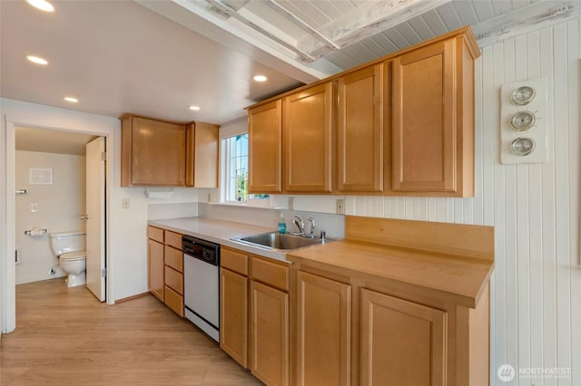 130 Priest Point Dr NE, Tulalip, WA 98271 - kitchen featuring white dishwasher, a sink, light countertops, light wood-type flooring, and recessed lighting