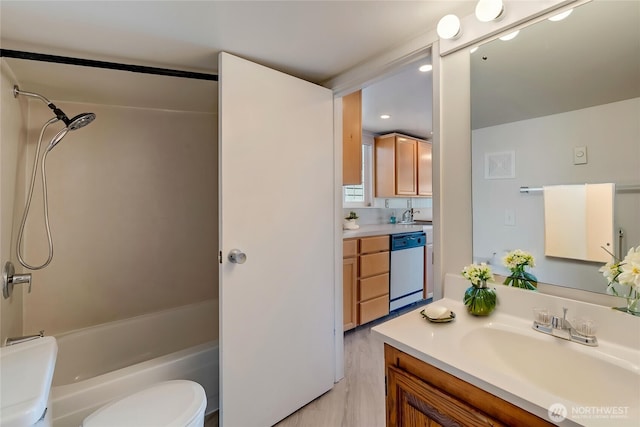 130 Priest Point Dr NE, Tulalip, WA 98271 - full bath with toilet, shower / tub combination, vanity, wood finished floors, and recessed lighting