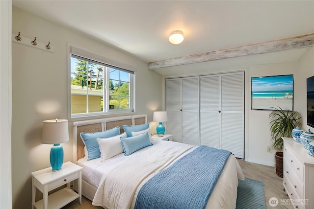130 Priest Point Dr NE, Tulalip, WA 98271 - bedroom with a closet and light wood finished floors