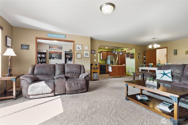 living room with a chandelier and light carpet