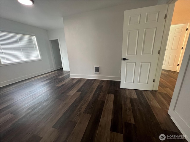 2802 Sumner Ave, Hoquiam, WA 98550 - spare room featuring visible vents, dark wood-style flooring, and baseboards