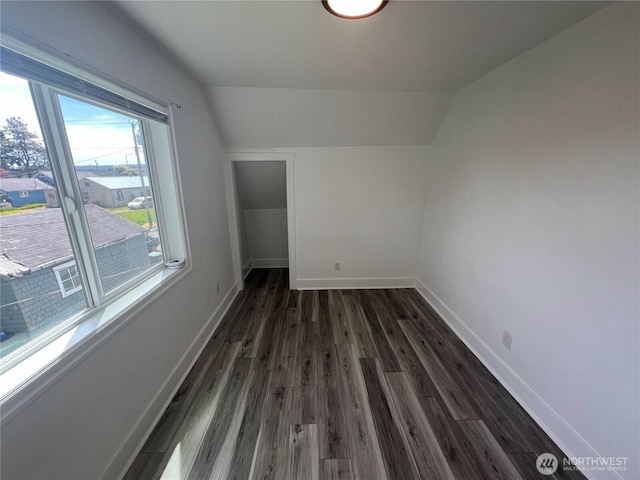 2802 Sumner Ave, Hoquiam, WA 98550 - additional living space featuring dark wood-style flooring, lofted ceiling, and baseboards