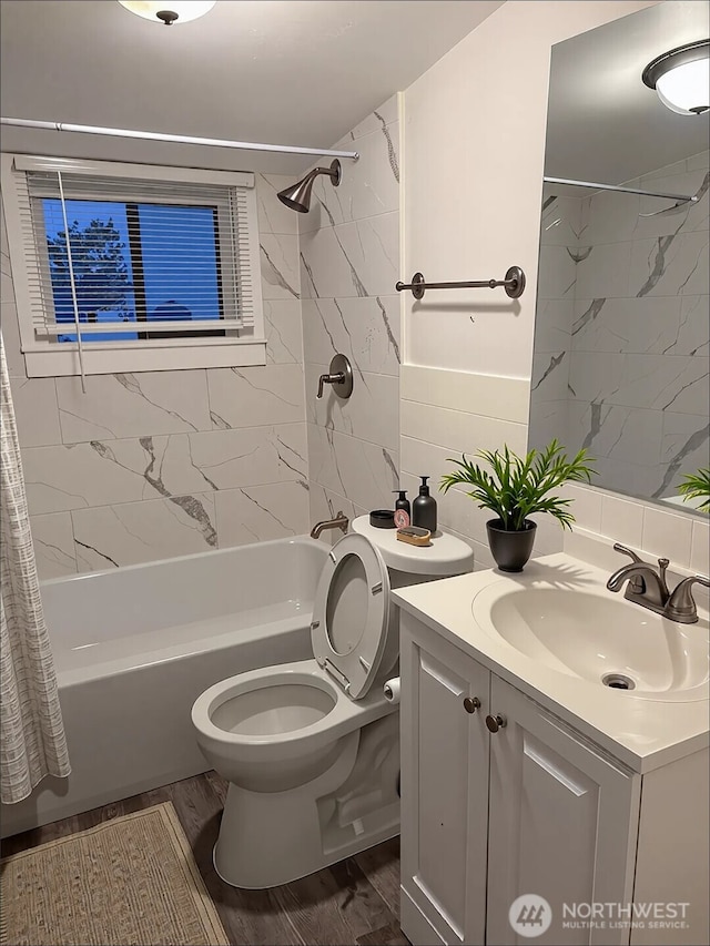 2802 Sumner Ave, Hoquiam, WA 98550 - bathroom featuring vanity, shower / bathtub combination with curtain, wood finished floors, and toilet