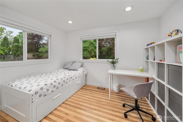 18810 111th Pl SE, Renton, WA 98055 - bedroom with wood finished floors, baseboards, and recessed lighting