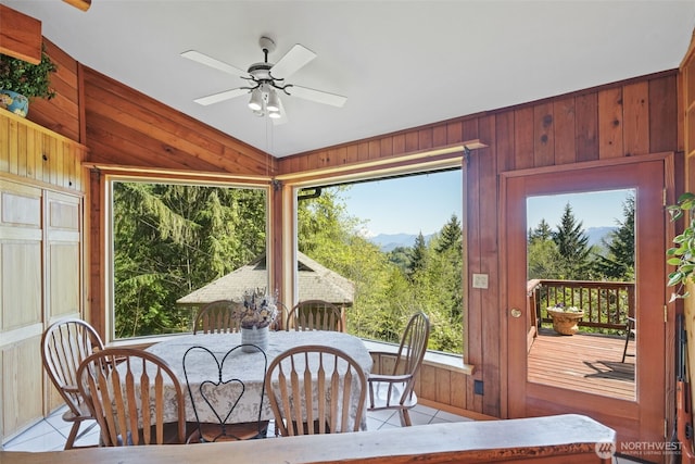 sunroom / solarium featuring healthy amount of natural light