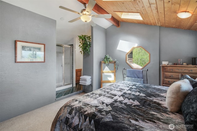 bedroom with a skylight, carpet floors, wooden ceiling, and ceiling fan