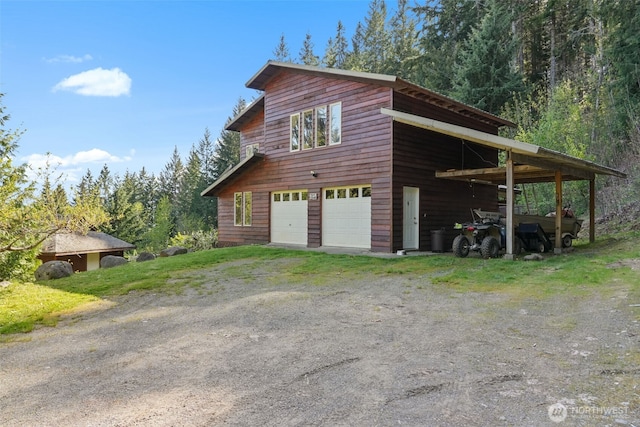 view of home's exterior with driveway