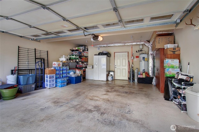 garage featuring secured water heater, white fridge with ice dispenser, and a garage door opener