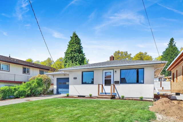 ranch-style home with a garage, stucco siding, a chimney, a front lawn, and driveway