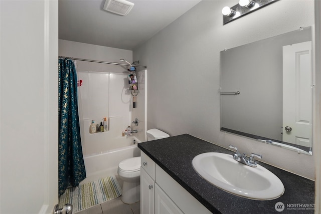 bathroom featuring toilet, vanity, shower / tub combo, and tile patterned flooring