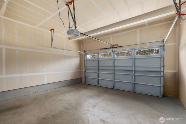 garage featuring a garage door opener