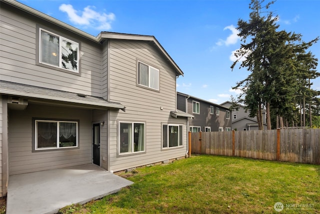back of house with a patio area