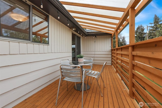 deck with outdoor dining space