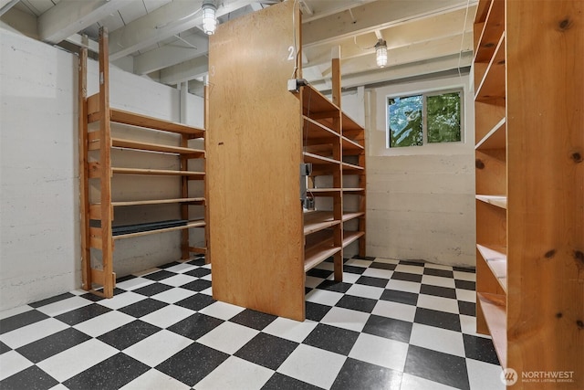 below grade area with tile patterned floors