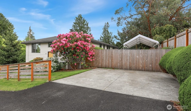 view of patio featuring fence