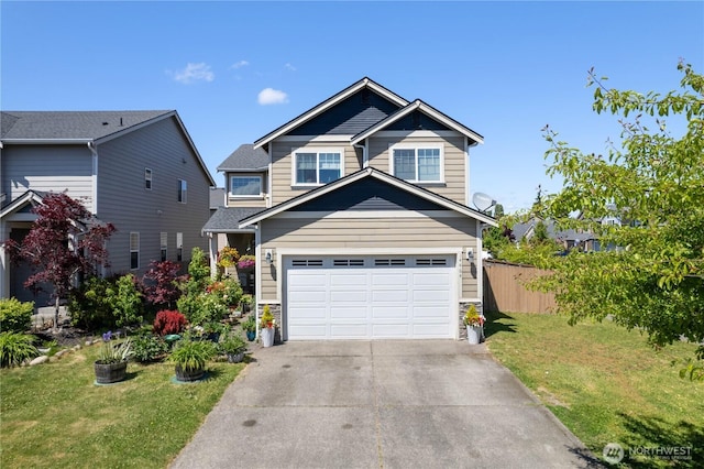 14464 99th Way SE, Yelm, WA 98597 - view of front of house with driveway and a garage