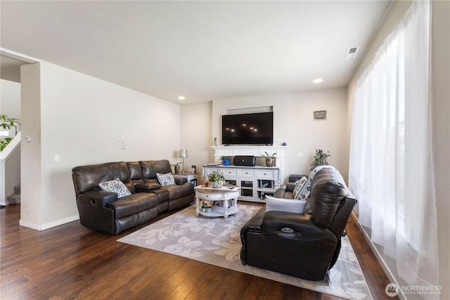 14464 99th Way SE, Yelm, WA 98597 - living area featuring hardwood / wood-style flooring, baseboards, and recessed lighting