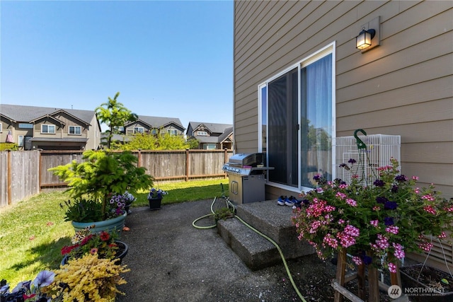 14464 99th Way SE, Yelm, WA 98597 - view of patio / terrace featuring area for grilling and a residential view
