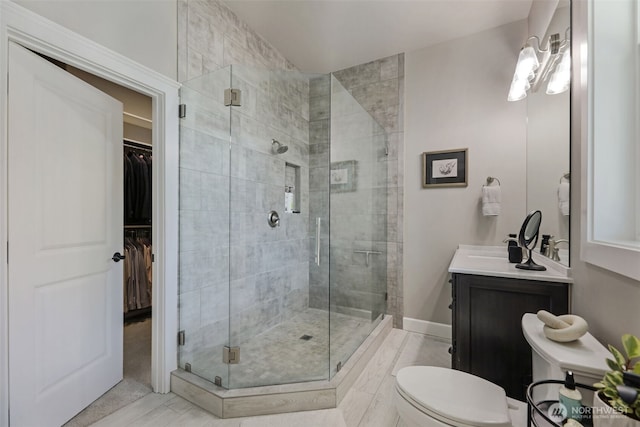6130 Maltby Rd, Woodinville, WA 98072 - full bath featuring a shower stall, toilet, vanity, and a spacious closet