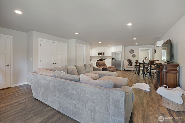 6130 Maltby Rd, Woodinville, WA 98072 - living area with dark wood-type flooring, recessed lighting, and baseboards
