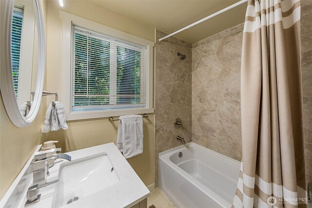 9919 Arrowsmith Ave S, Seattle, WA 98118 - bathroom with shower / bath combo with shower curtain and vanity
