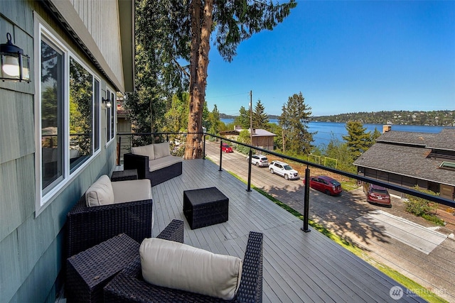 9919 Arrowsmith Ave S, Seattle, WA 98118 - deck featuring an outdoor hangout area and a water view