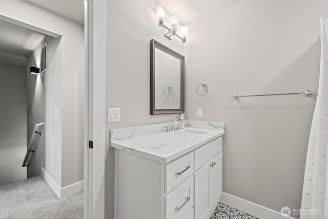 3342 Greenwood Ave W, University Place, WA 98466 - bathroom featuring baseboards and vanity