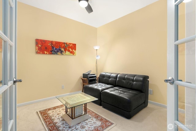 2440 S Steele St Unit 101, Tacoma, WA 98405 - carpeted living room featuring a ceiling fan and baseboards