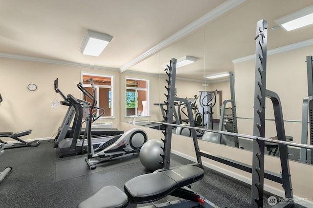 2440 S Steele St Unit 101, Tacoma, WA 98405 - exercise room featuring crown molding and baseboards