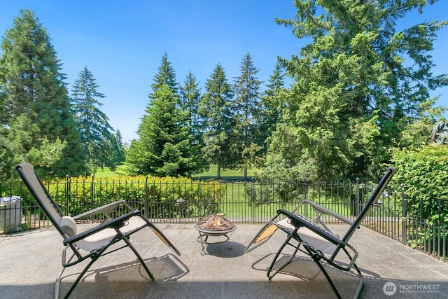 2440 S Steele St Unit 101, Tacoma, WA 98405 - view of patio featuring a fire pit
