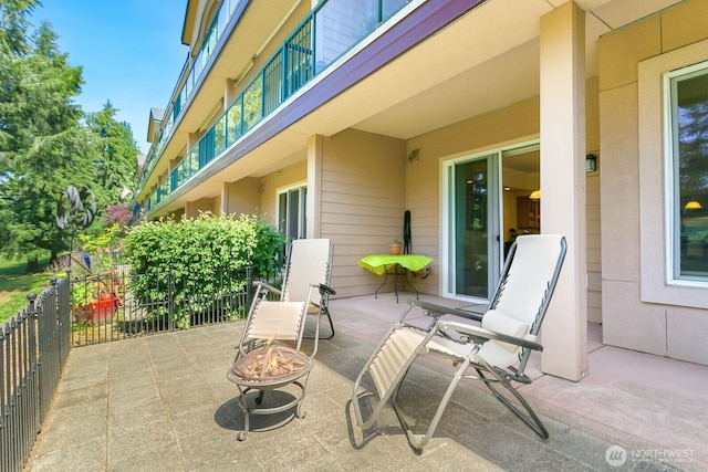 2440 S Steele St Unit 101, Tacoma, WA 98405 - view of patio / terrace featuring a fire pit