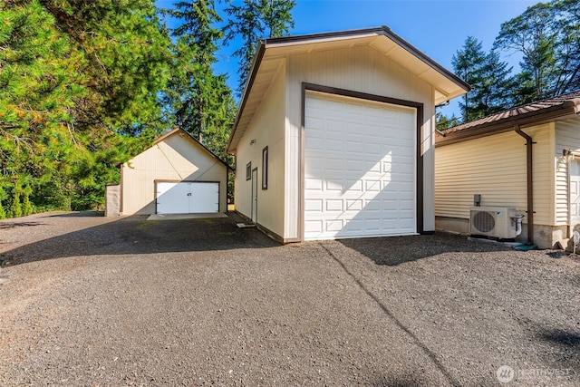 detached garage with a cooling unit