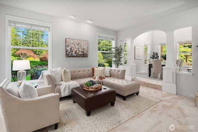 26108 SE 27th St, Sammamish, WA 98075 - sitting room featuring arched walkways, ornate columns, and carpet flooring