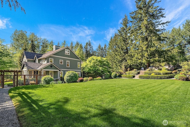 26108 SE 27th St, Sammamish, WA 98075 - view of grassy yard featuring a porch