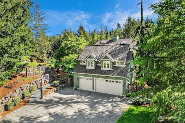 26108 SE 27th St, Sammamish, WA 98075 - view of front facade featuring concrete driveway, a shingled roof, fence, a garage, and a chimney