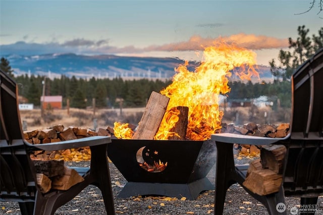 balcony featuring an outdoor fire pit