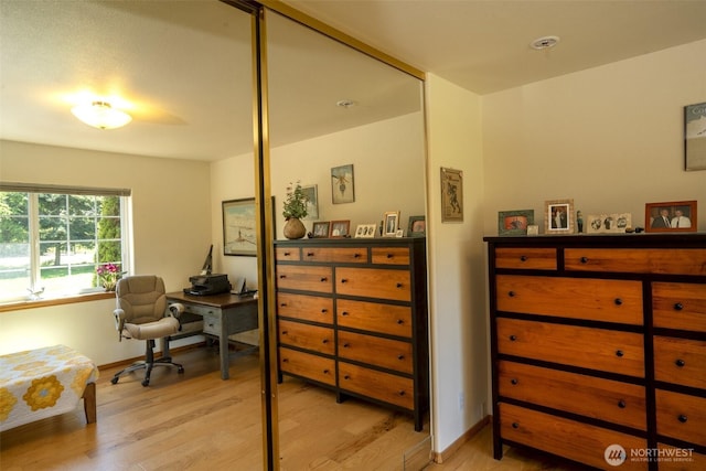 162 W Nelson Rd, Sequim, WA 98382 - bedroom featuring light wood-type flooring, a desk, and baseboards