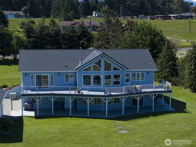 162 W Nelson Rd, Sequim, WA 98382 - rear view of house featuring a wooden deck, a patio area, and a yard