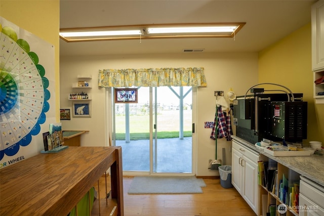 162 W Nelson Rd, Sequim, WA 98382 - doorway featuring light wood finished floors and baseboards