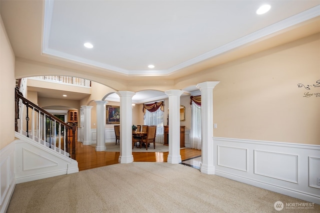 13106 SE 261st Pl, Kent, WA 98030 - unfurnished bedroom featuring decorative columns, recessed lighting, a decorative wall, arched walkways, and a wainscoted wall