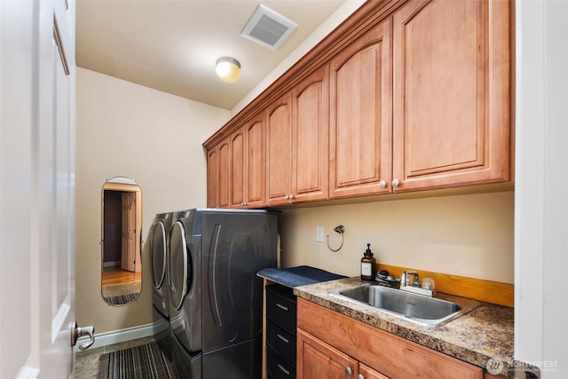 13106 SE 261st Pl, Kent, WA 98030 - laundry room featuring separate washer and dryer, cabinet space, and arched walkways