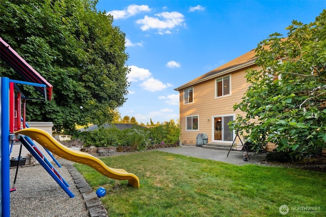 13106 SE 261st Pl, Kent, WA 98030 - view of green lawn with a playground and a patio