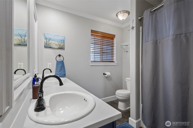 full bathroom featuring double vanity, crown molding, toilet, and a shower with shower curtain