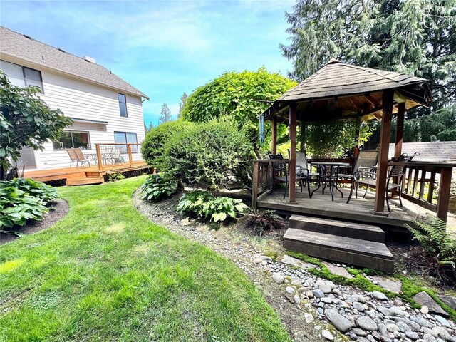 332 162nd Pl SE, Bothell, WA 98012 - view of green lawn featuring a gazebo, outdoor dining space, and a wooden deck