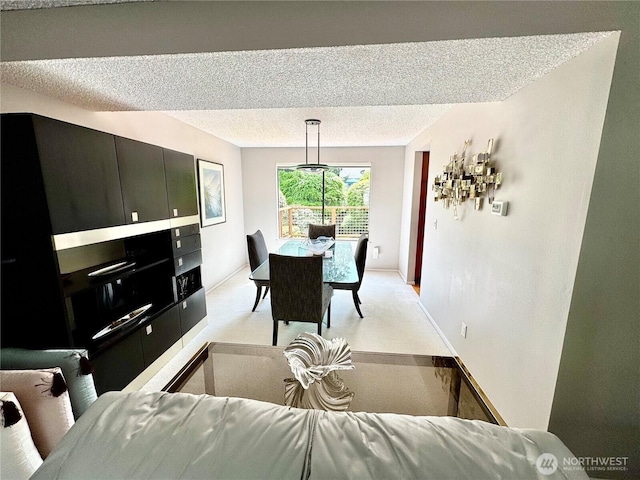 332 162nd Pl SE, Bothell, WA 98012 - dining room featuring a textured ceiling and light colored carpet