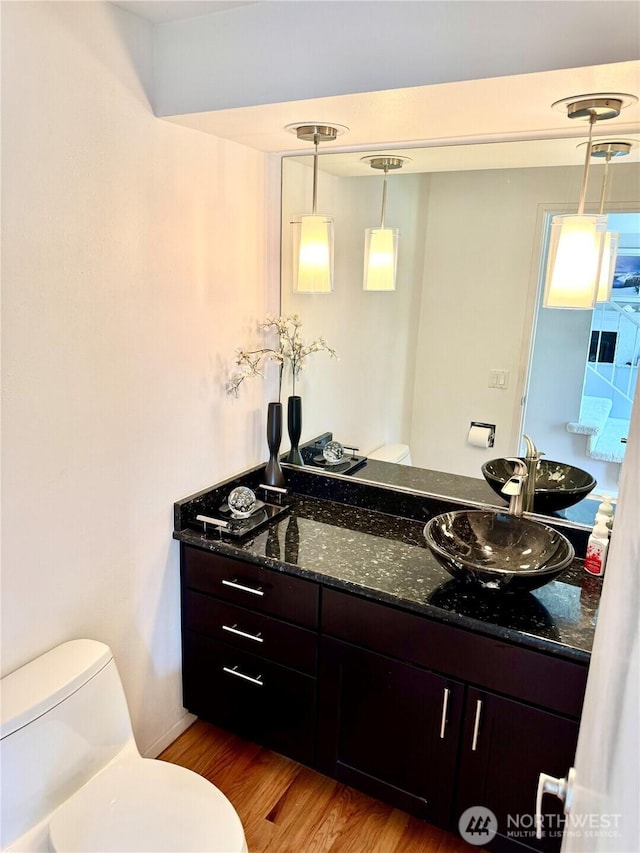 332 162nd Pl SE, Bothell, WA 98012 - bathroom with toilet, wood finished floors, and vanity