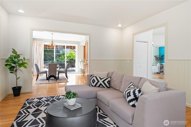 702 Woodland Dr, Port Townsend, WA 98368 - living area with a wainscoted wall, light wood finished floors, and recessed lighting