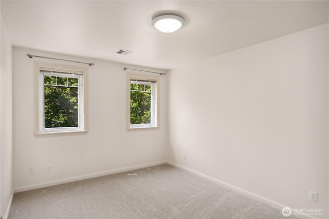 702 Woodland Dr, Port Townsend, WA 98368 - spare room with baseboards and carpet flooring
